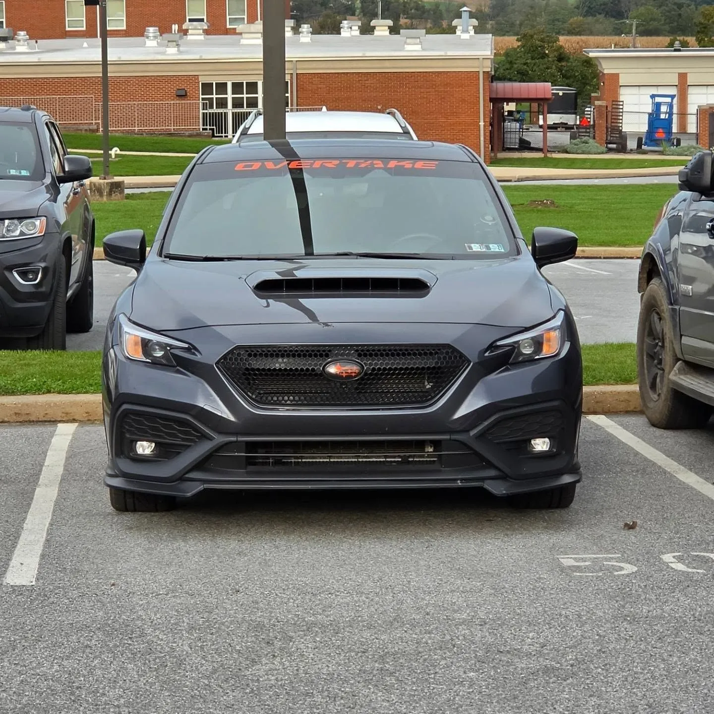 Front view with the Overtake banner