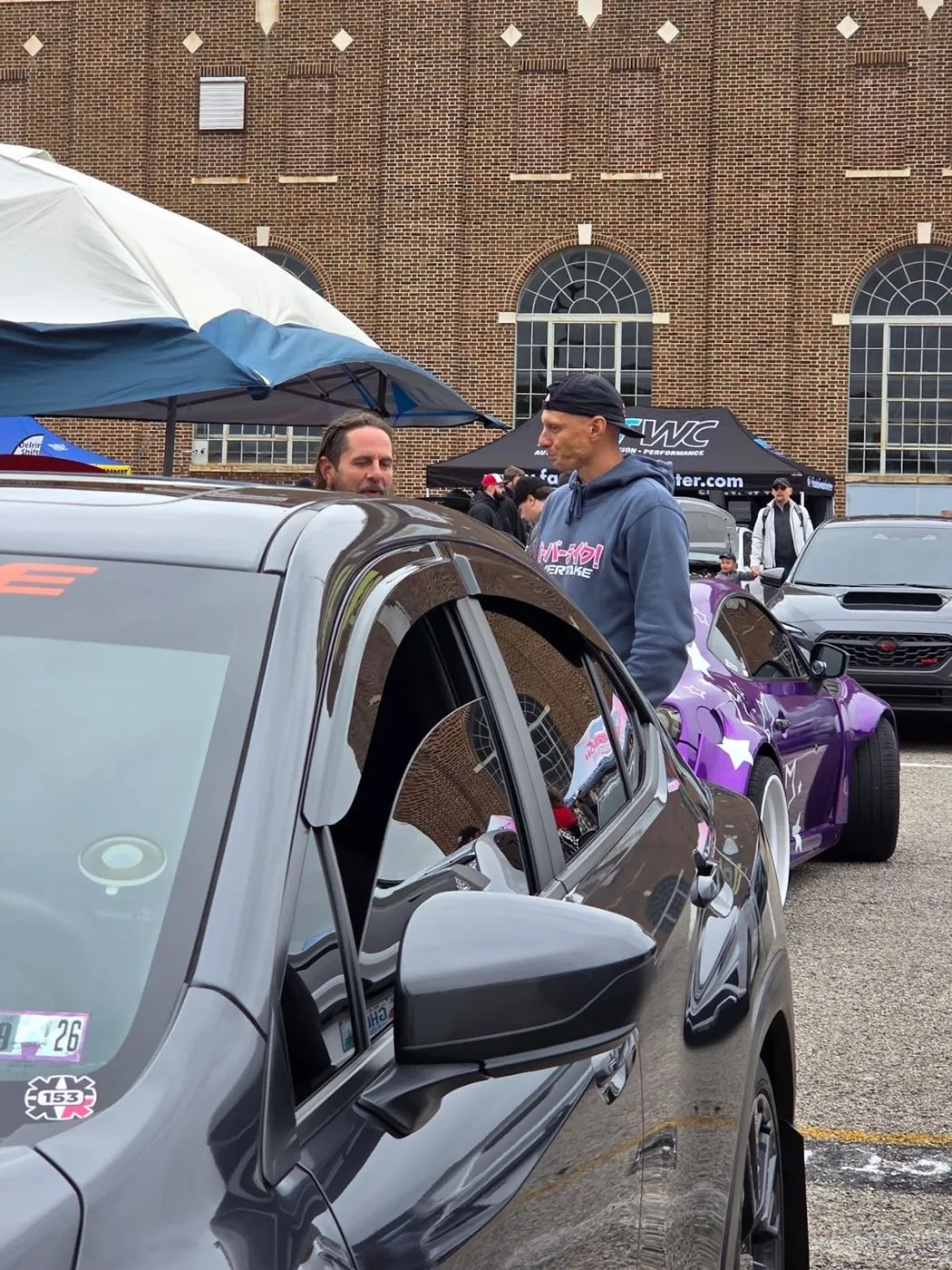 Talking cars beside Fenrir at Boxerfest
