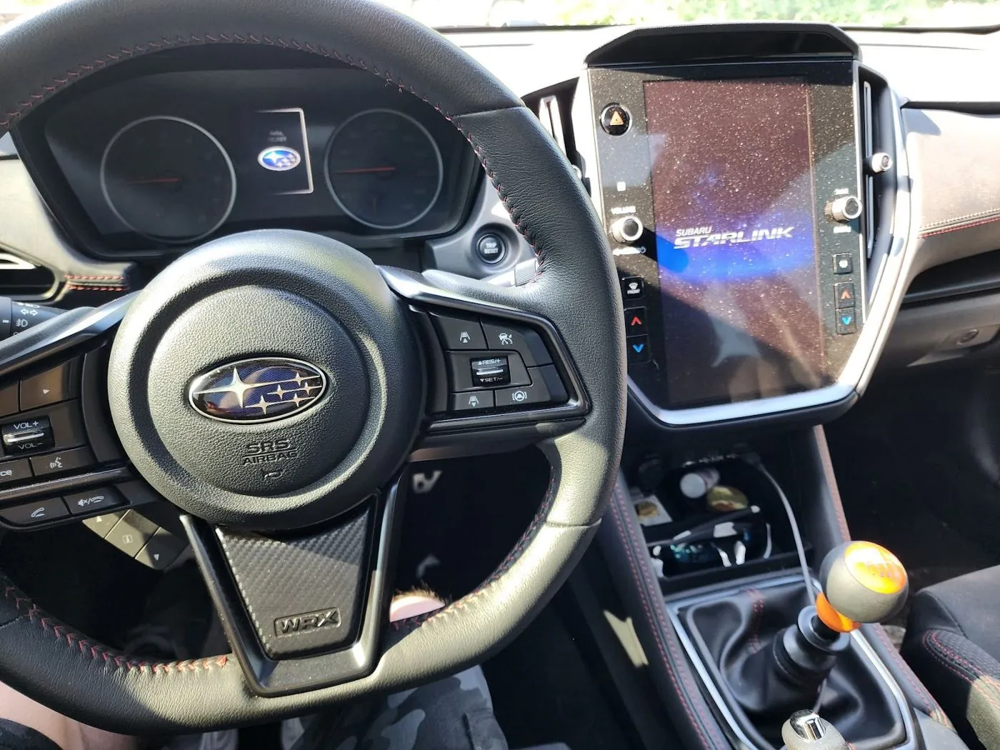 Wheel, screen and the orange knob