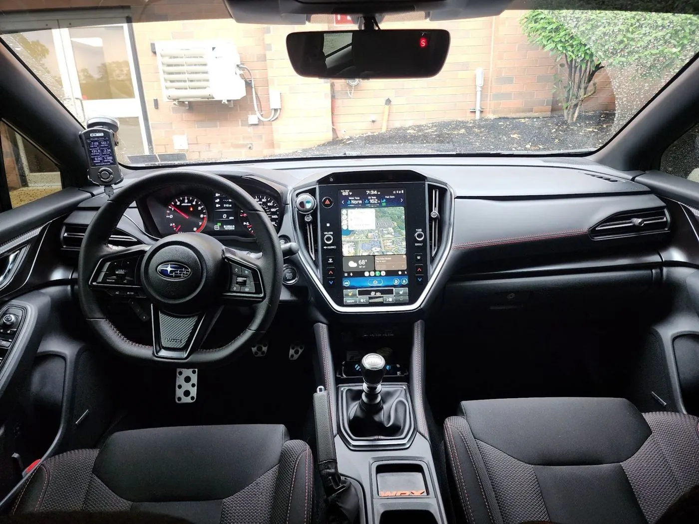 Full dash from the back seat