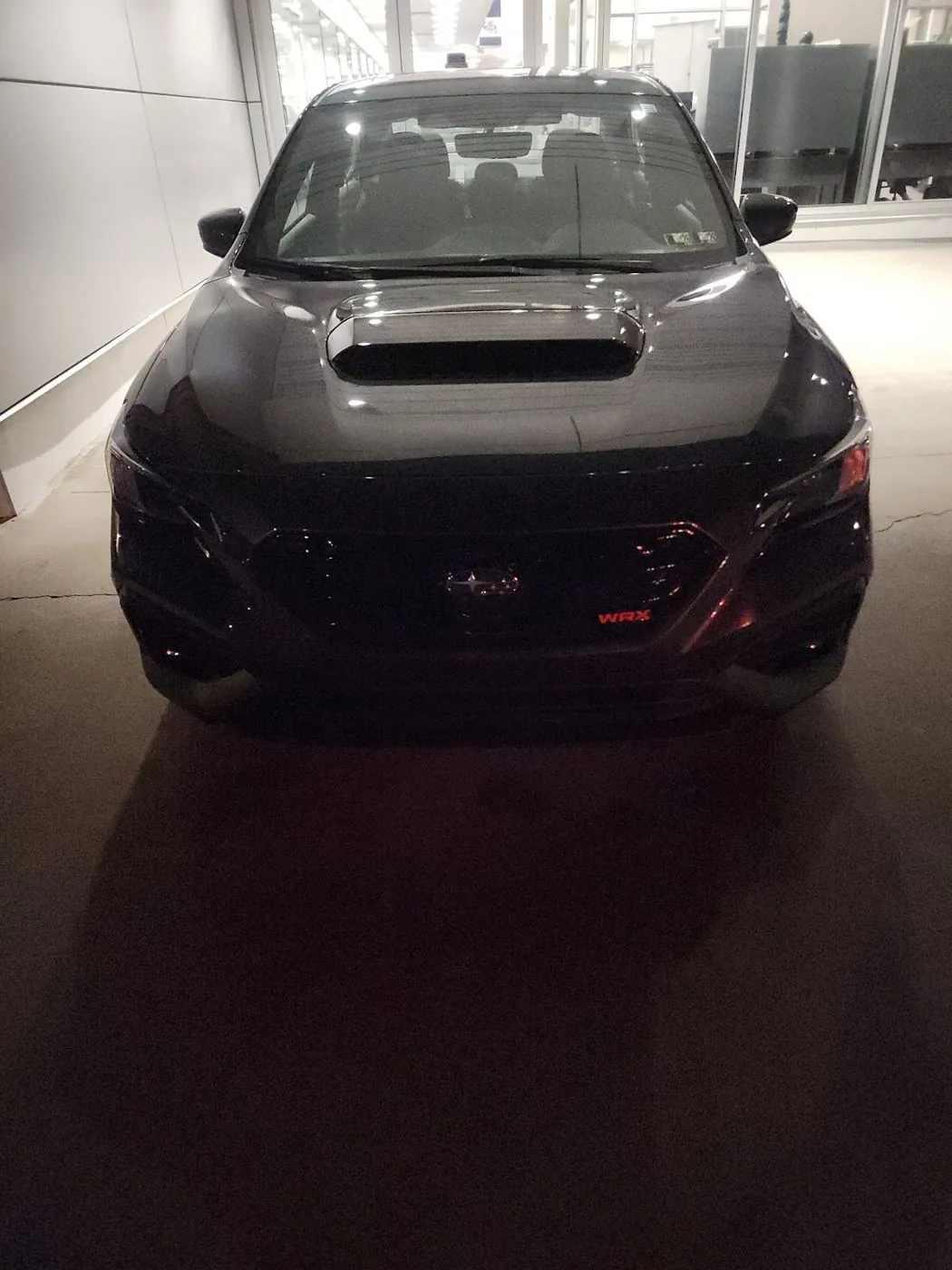 Delivery night under the showroom lights