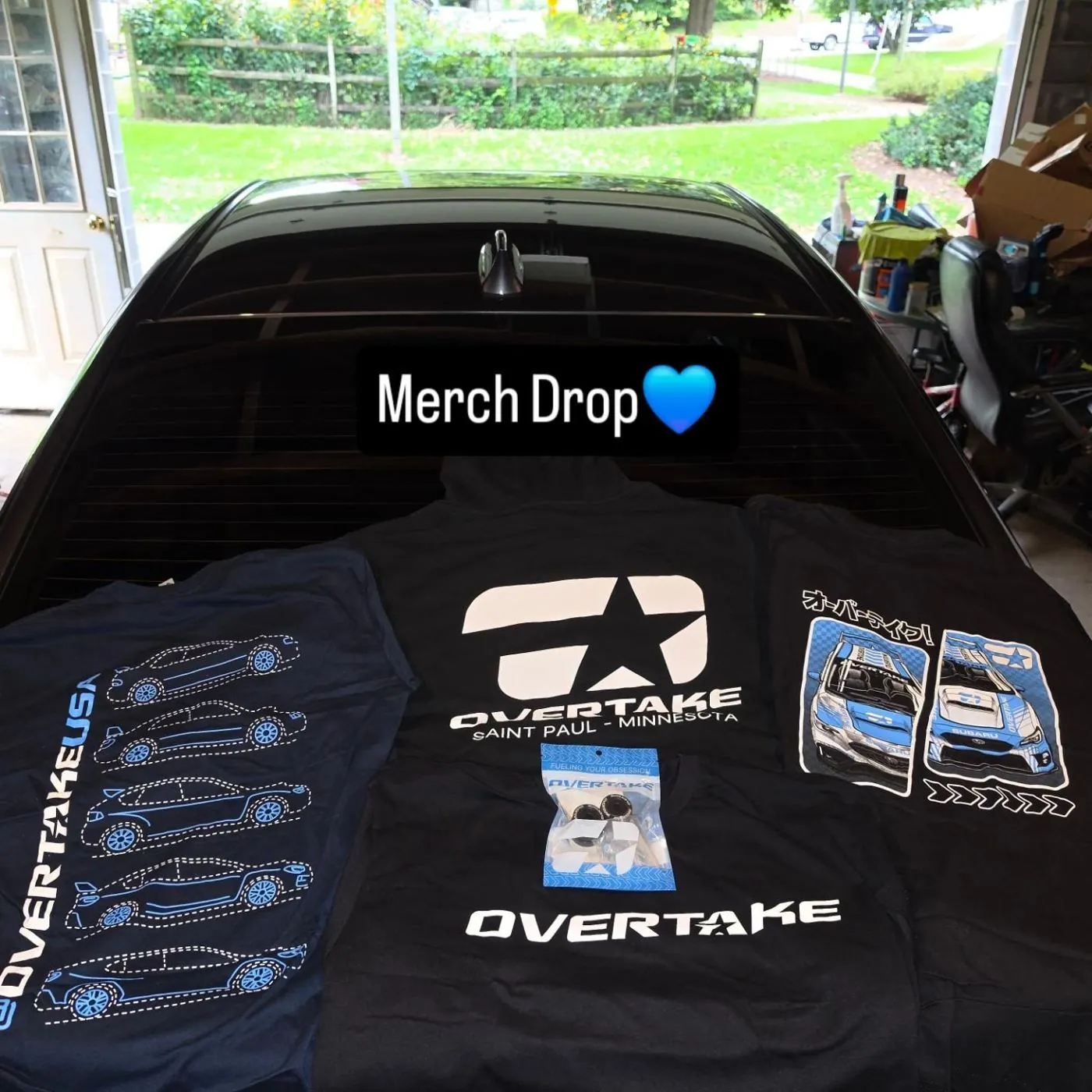 Overtake merch drop on the hood