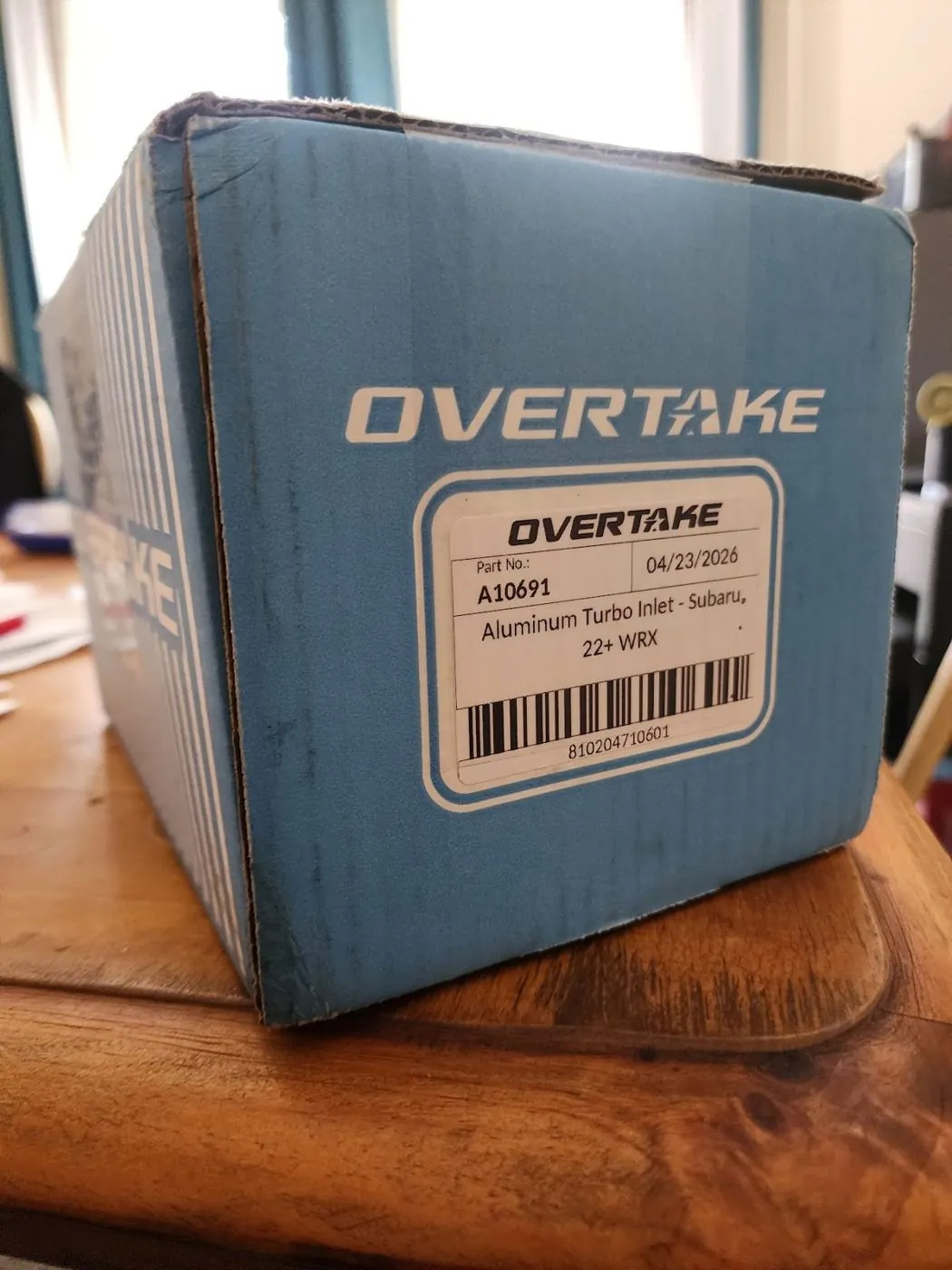 An Overtake box on the table