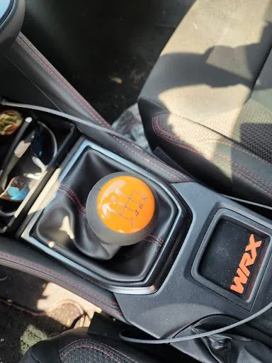 Orange shift knob close-up