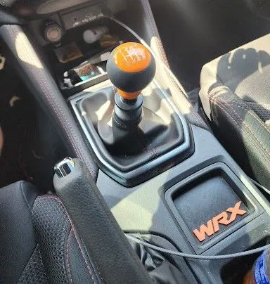Orange Billetworkz shift knob and WRX change pocket