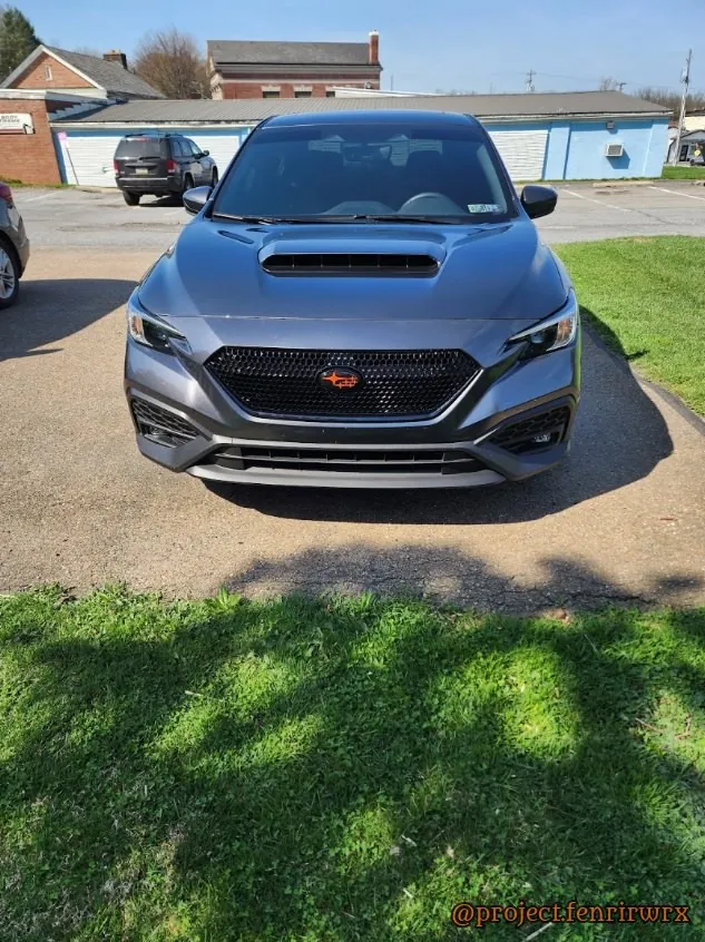 Sport grille and the orange star badge up front