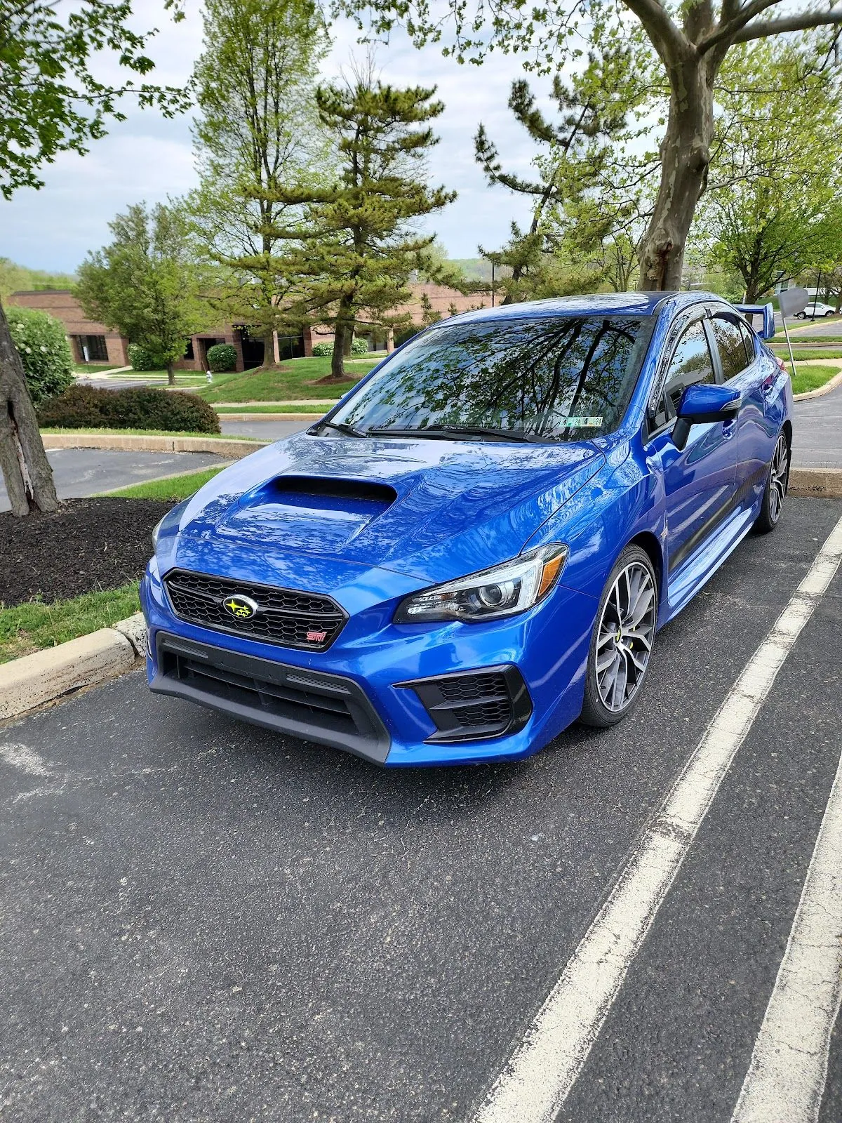 Blue 2020 WRX STI, front three-quarter