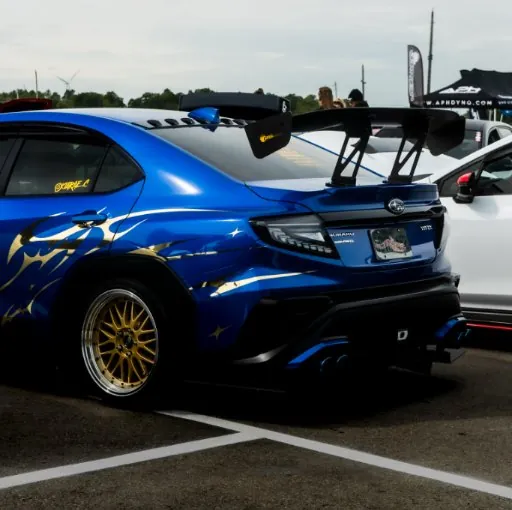 @kiarae.c's WRX rear three quarter with the wing