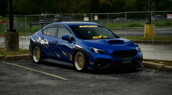 @kiarae.c's WRX side profile at a meet