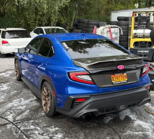 @mako.vb's WRX from the rear on bronze wheels