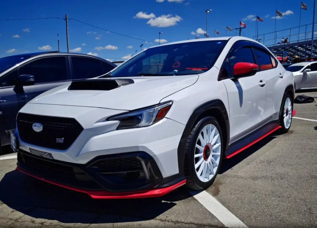 @whitecherrywrx's WRX front three quarter at a show